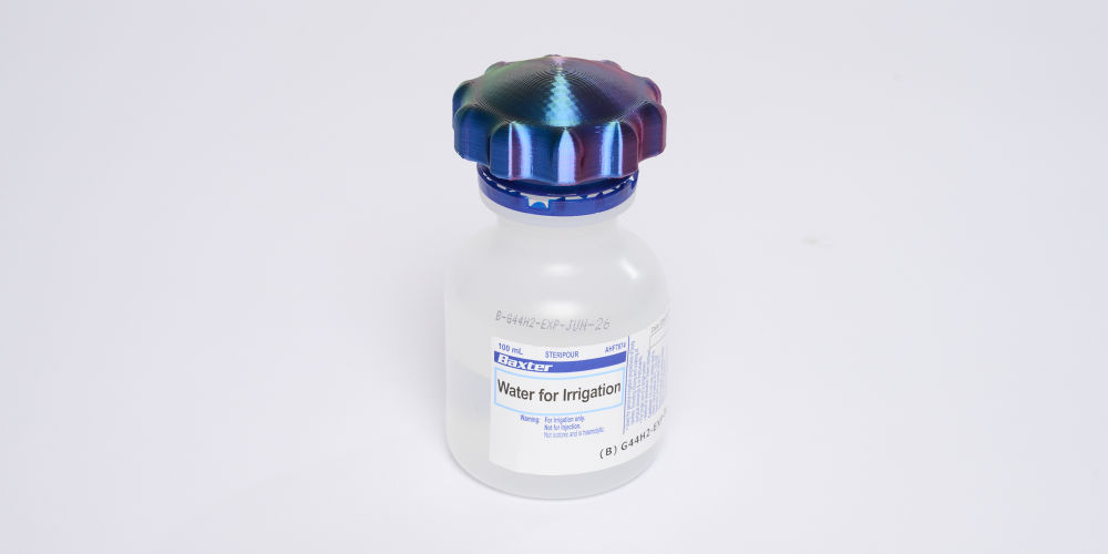 Saline bottle cap grip designed by Dr Michael Schenberg 1